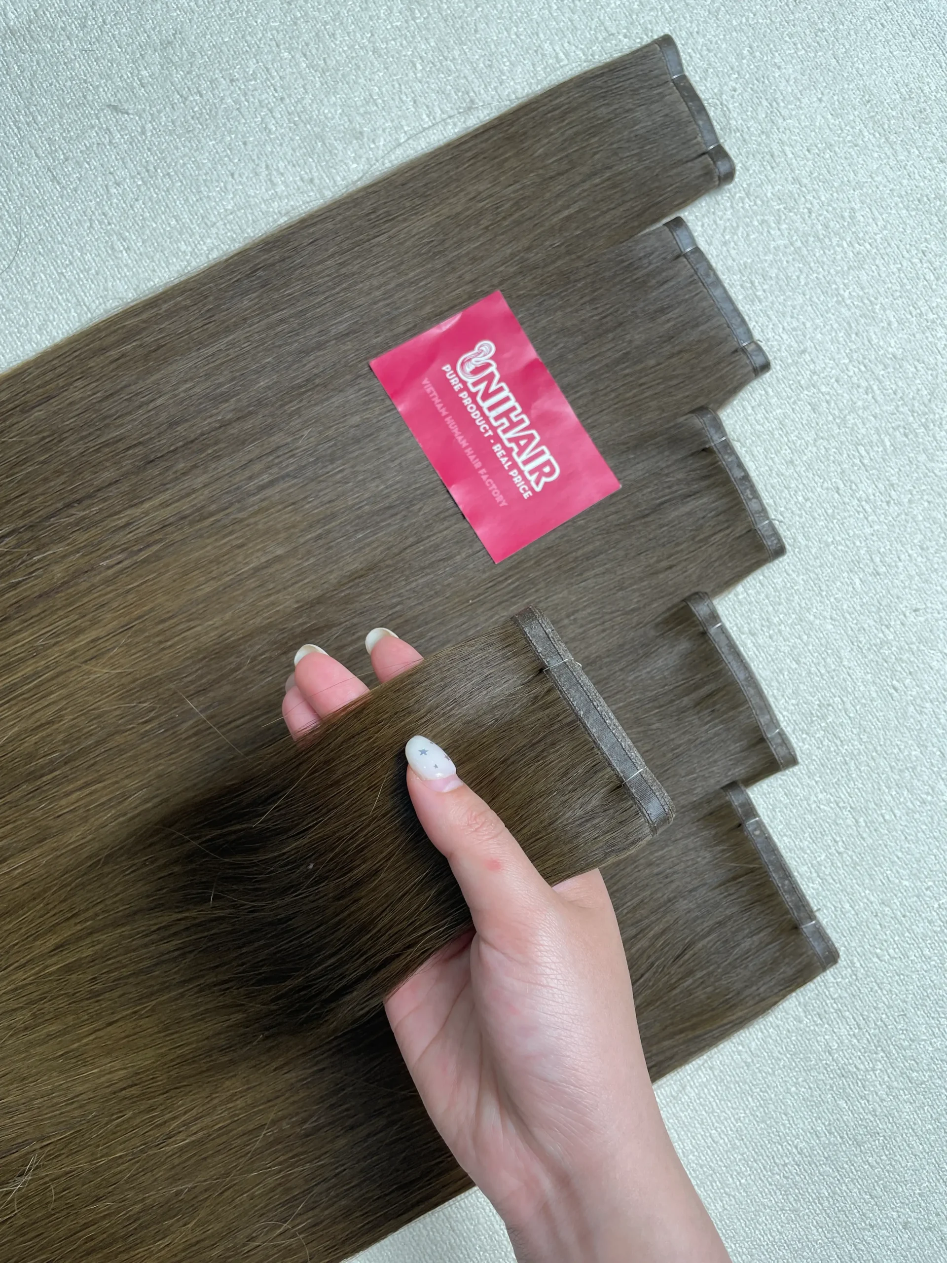 Flat Weft pressed-flat base close-up from Unihairvn Vietnam hair factory Flat Weft pressed-flat base close-up from Unihairvn Vietnam hair factory