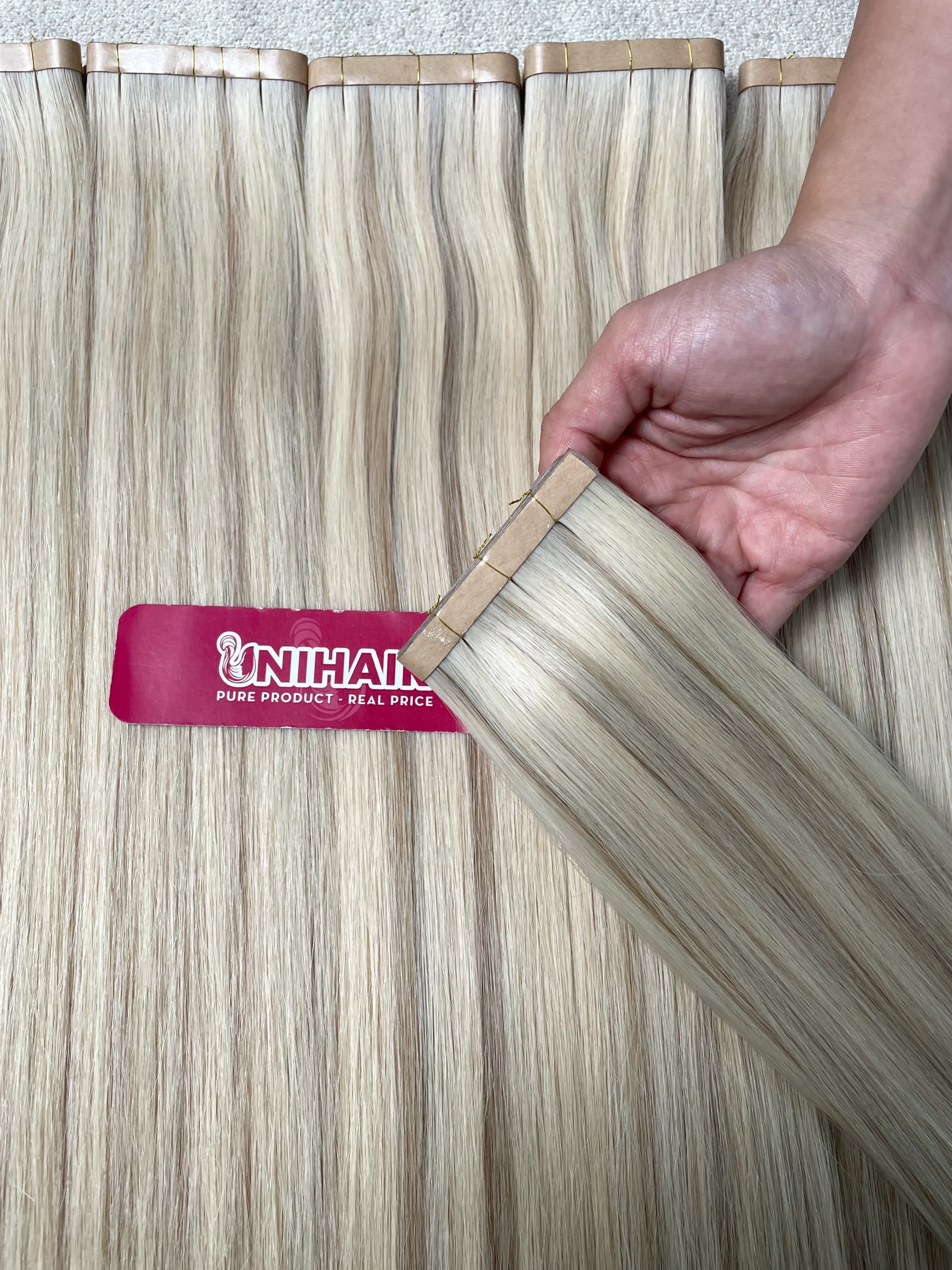 Long Tape-In Extensions image 2 showing hero product visual by Unihairvn Vietnam hair factory