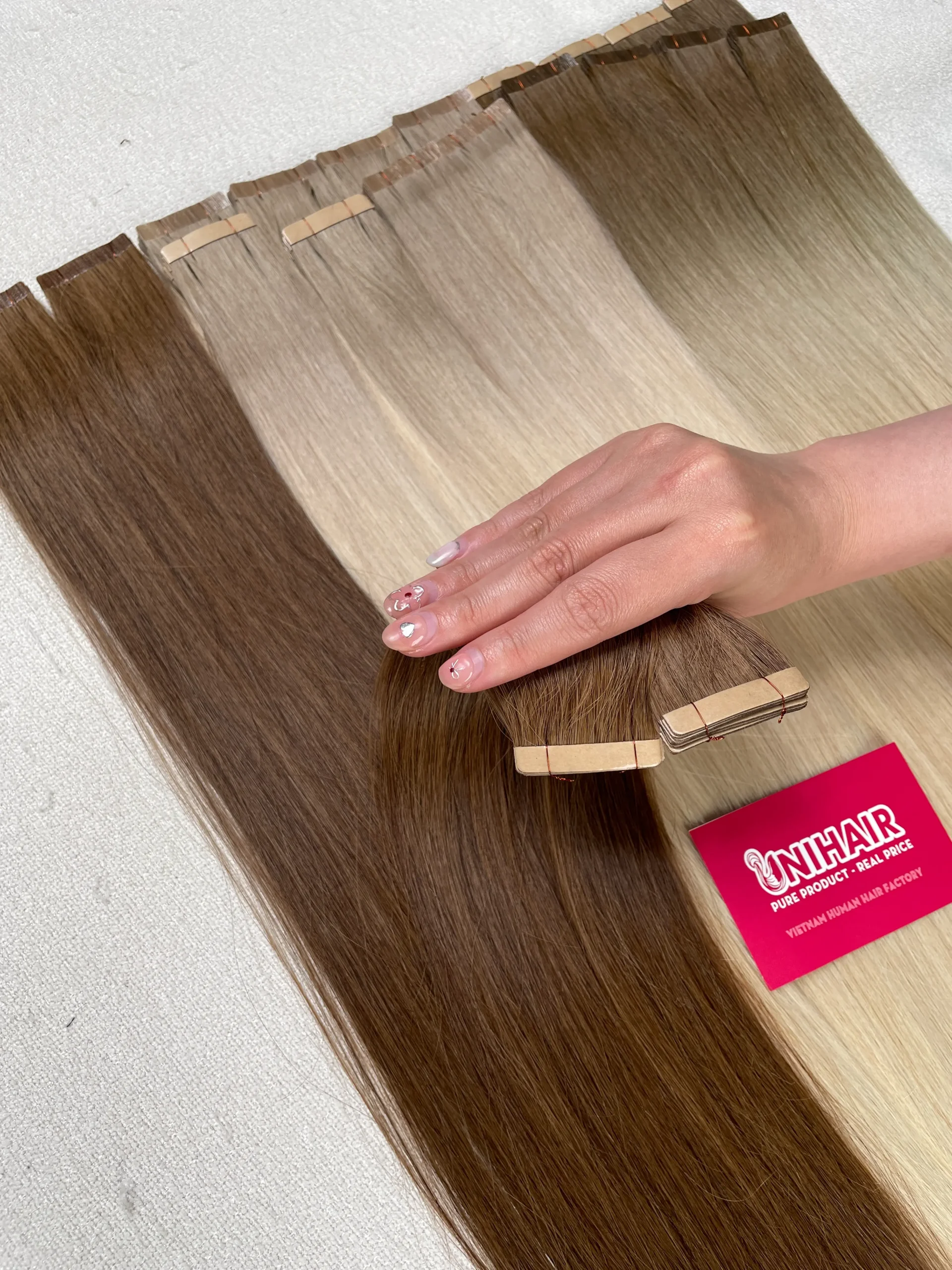 Normal Tape-In Hair Extensions image 10 showing product gallery close-up by Unihairvn Vietnam hair factory Normal Tape-In Hair Extensions image 10 showing product gallery close-up by Unihairvn Vietnam hair factory