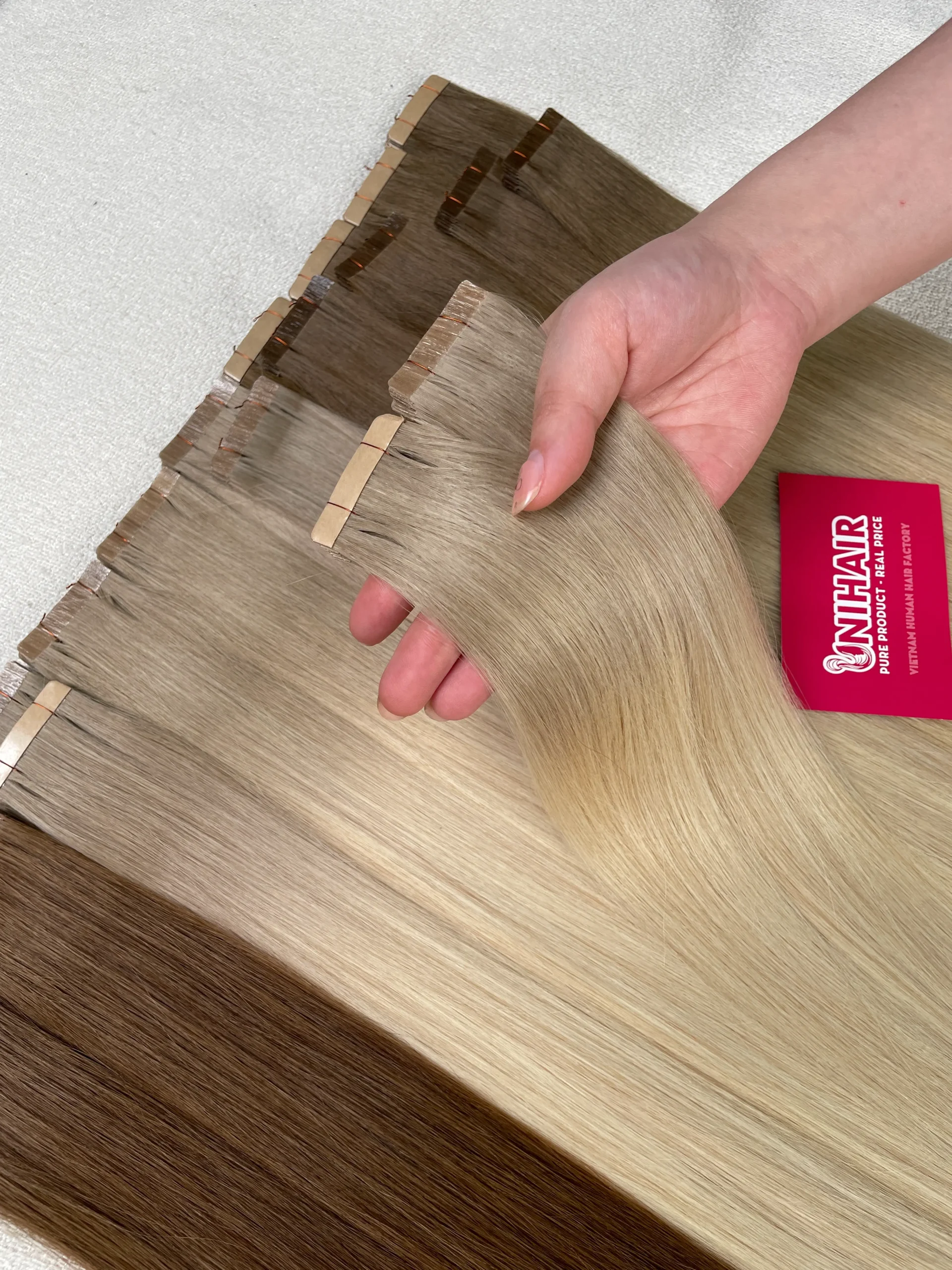Normal Tape-In Hair Extensions image 11 showing product gallery close-up by Unihairvn Vietnam hair factory Normal Tape-In Hair Extensions image 11 showing product gallery close-up by Unihairvn Vietnam hair factory