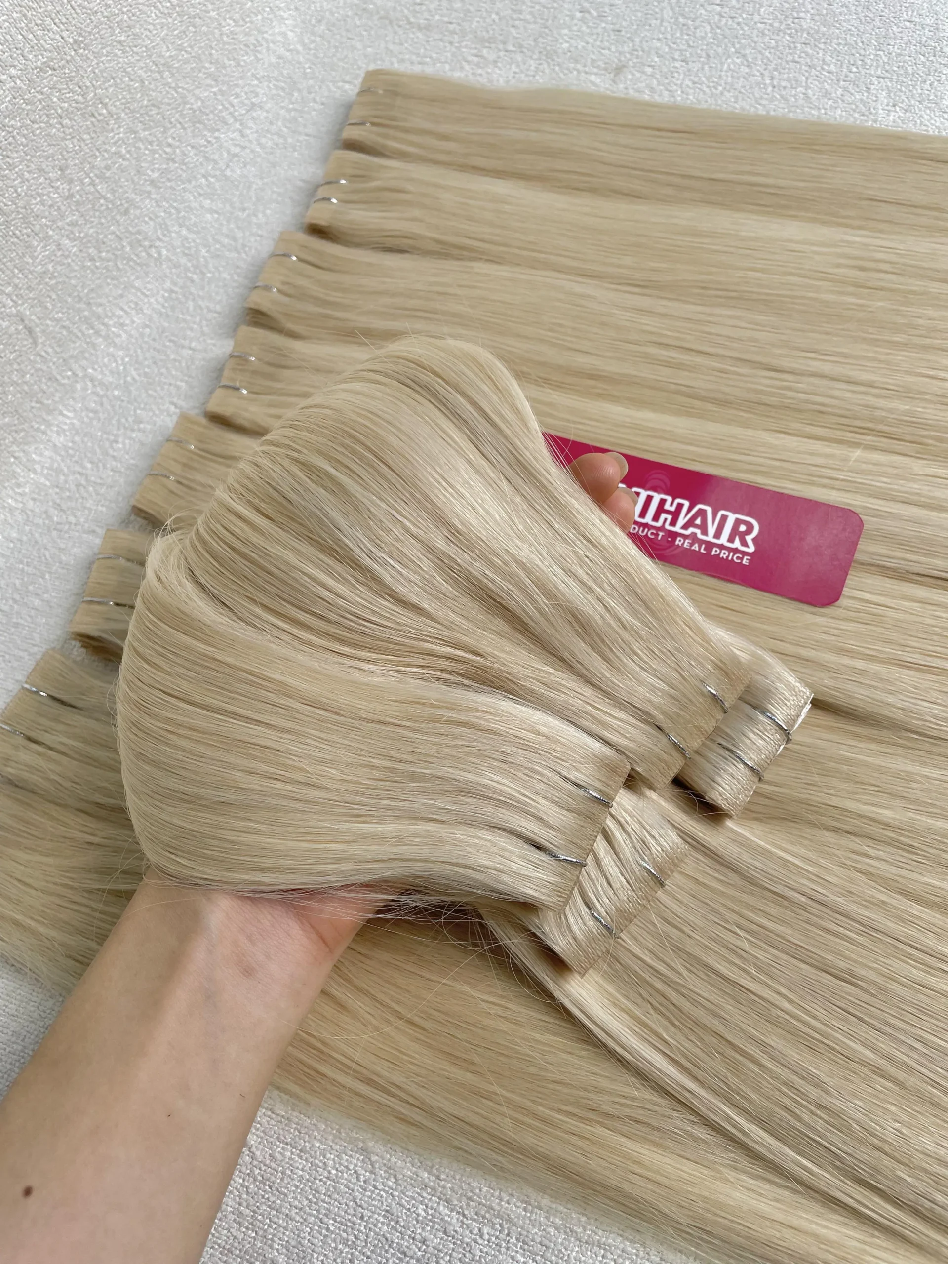 Tape-In Hair Extensions image 18 showing product gallery close-up by Unihairvn Vietnam hair factory Tape-In Hair Extensions image 18 showing product gallery close-up by Unihairvn Vietnam hair factory