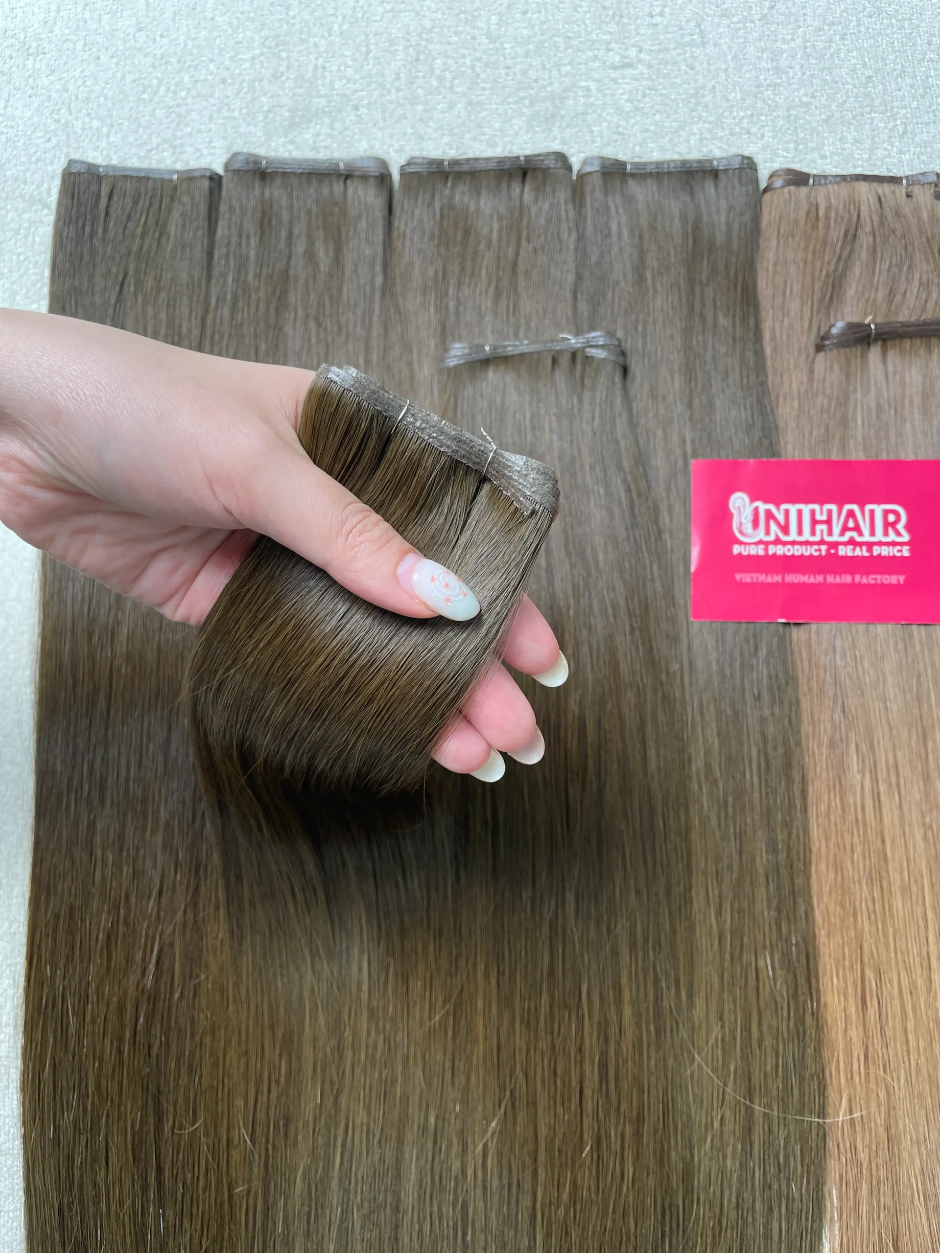 Genius Weft hair length and texture close-up by Unihairvn Genius Weft hair length and texture close-up by Unihairvn