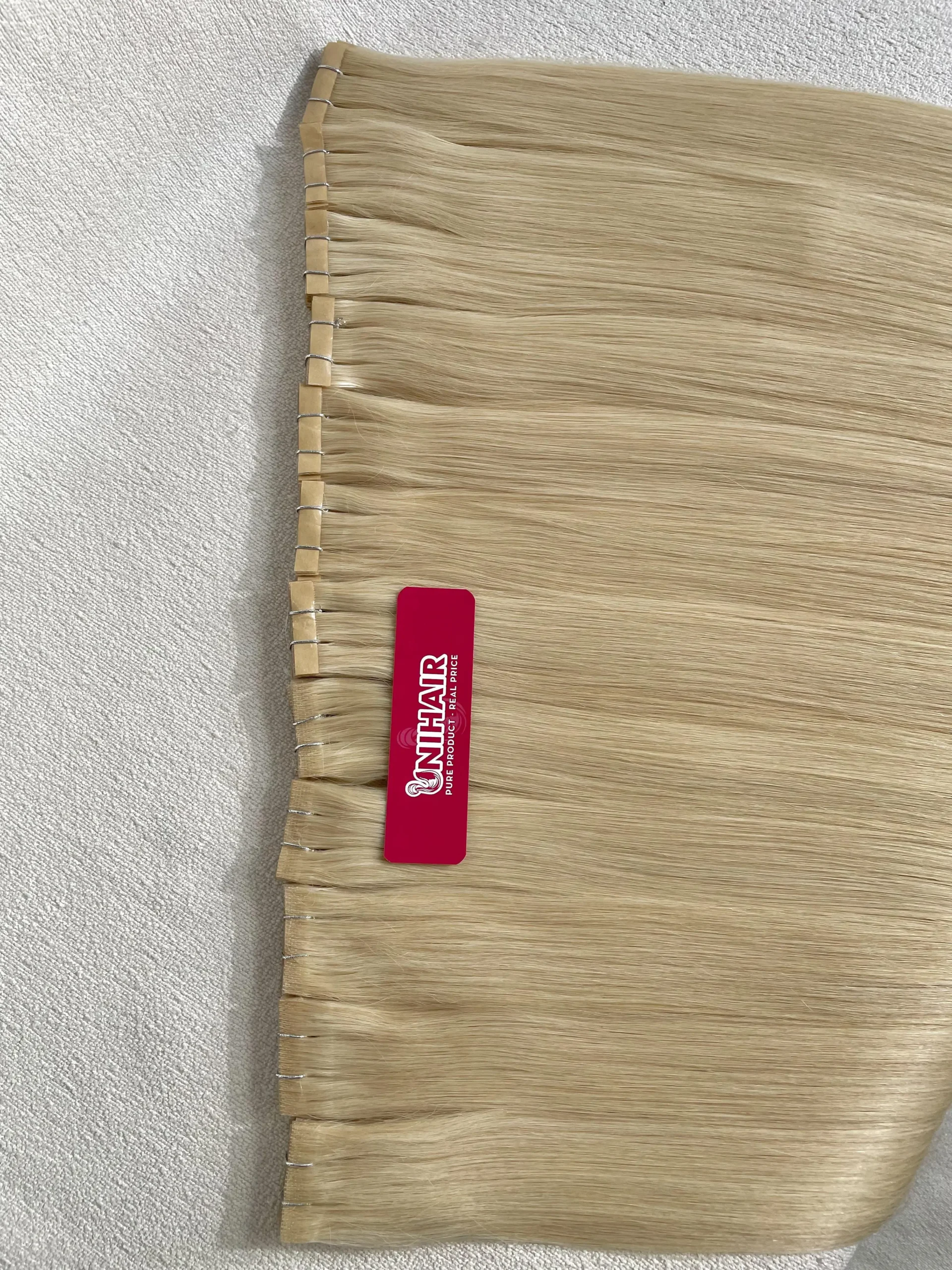 Tape-In Hair Extensions image 20 showing product gallery close-up by Unihairvn Vietnam hair factory Tape-In Hair Extensions image 20 showing product gallery close-up by Unihairvn Vietnam hair factory
