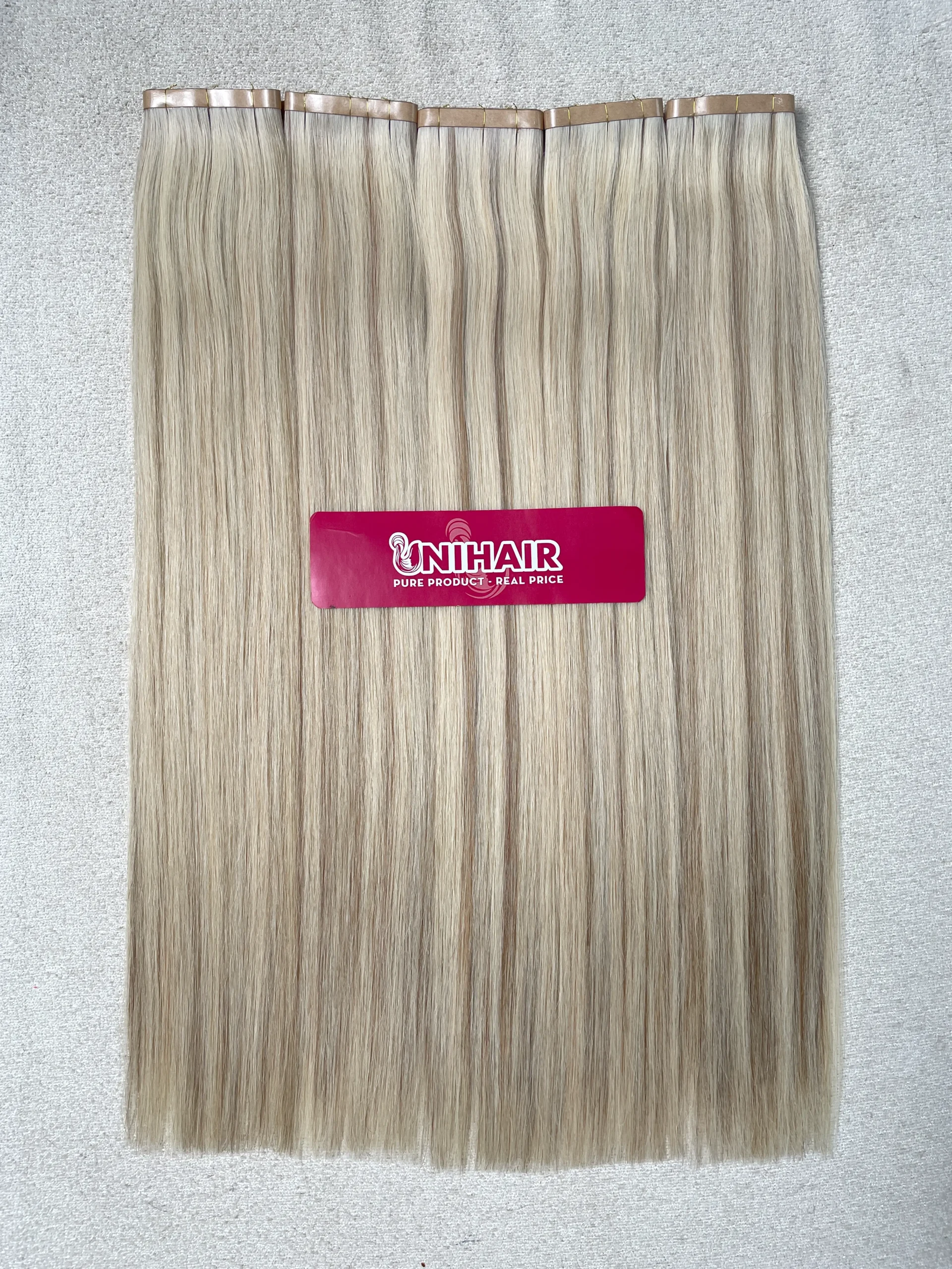 Tape-In Hair Extensions image 32 showing product gallery close-up by Unihairvn Vietnam hair factory Tape-In Hair Extensions image 32 showing product gallery close-up by Unihairvn Vietnam hair factory