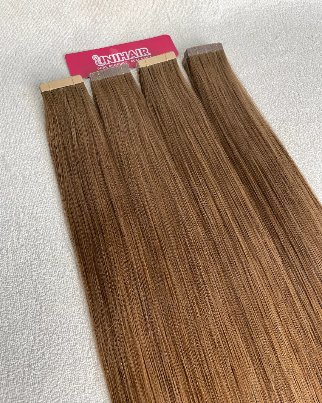 Fabric Tape-In Hair Extensions product image showing flexible fabric-backed tape construction