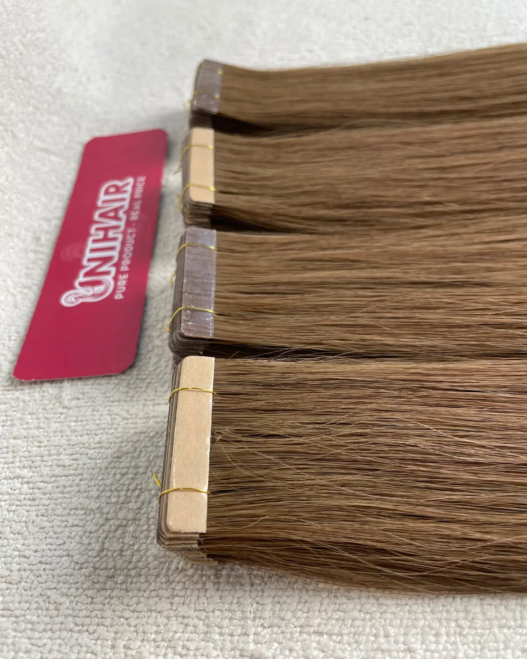 Fabric Tape-In Hair Extensions close-up showing stronger textile tape backing for salon use
