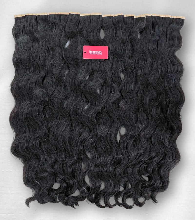 Natural Wavy Tape In Extensions – Soft, Reusable and Raw Vietnamese Hair 7 Natural Wavy Tape In Extensions – Soft, Reusable and Raw Vietnamese Hair - Image 7