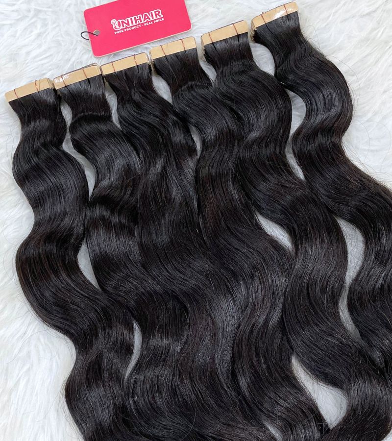 Natural Wavy Tape In Extensions – Soft, Reusable and Raw Vietnamese Hair 5 Natural Wavy Tape In Extensions – Soft, Reusable and Raw Vietnamese Hair - Image 5