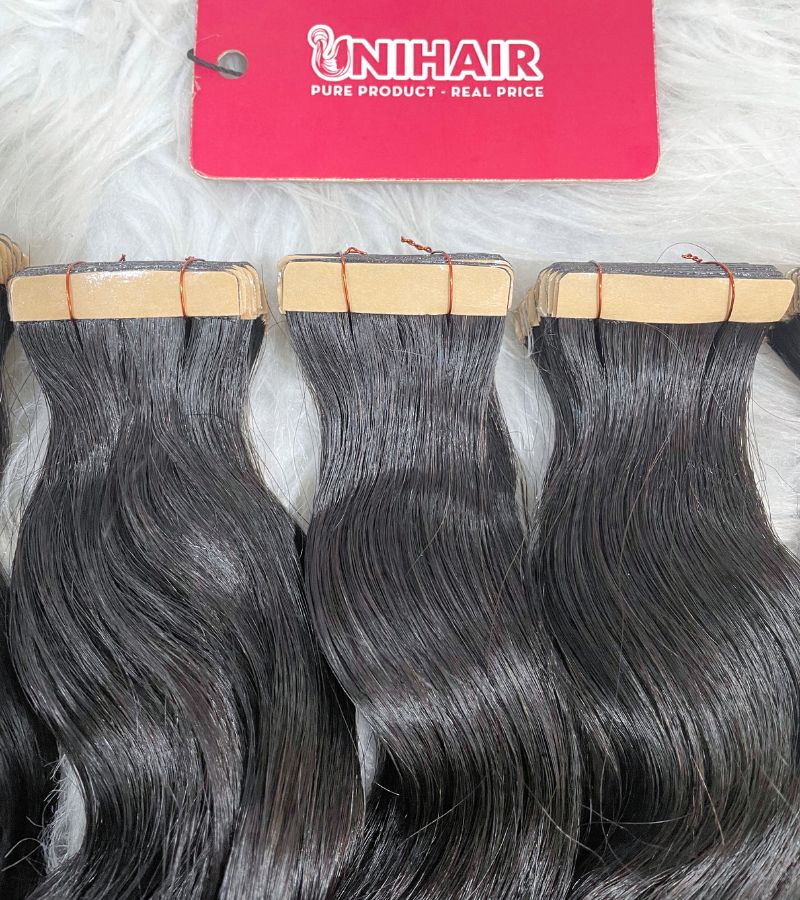 Natural Wavy Tape In Extensions – Soft, Reusable and Raw Vietnamese Hair 6 Natural Wavy Tape In Extensions – Soft, Reusable and Raw Vietnamese Hair - Image 6