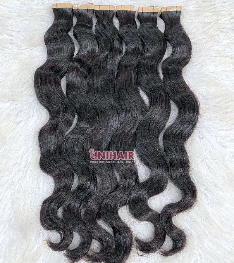 Natural Wavy Tape In Extensions – Soft, Reusable and Raw Vietnamese Hair 10 Natural Wavy Tape In Extensions – Soft, Reusable and Raw Vietnamese Hair - Image 10